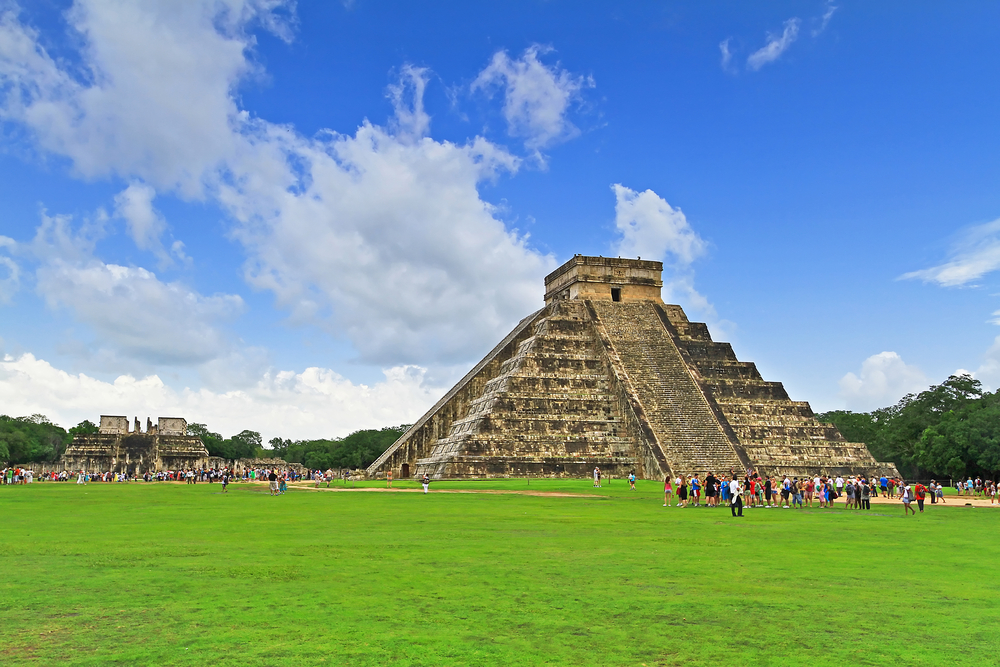 The historic pyramids of Chichen Itza with people The historic pyramids of Chichen Itza with people