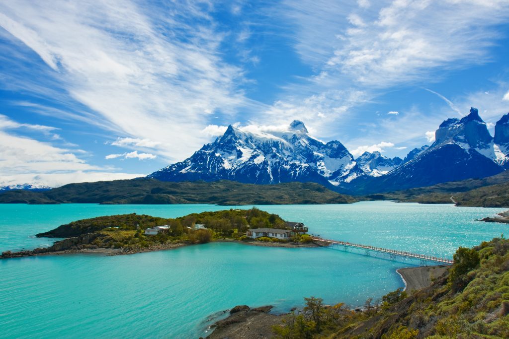 Blue lake with mountains in the background torres del paine Blue lake with mountains in the background torres del paine