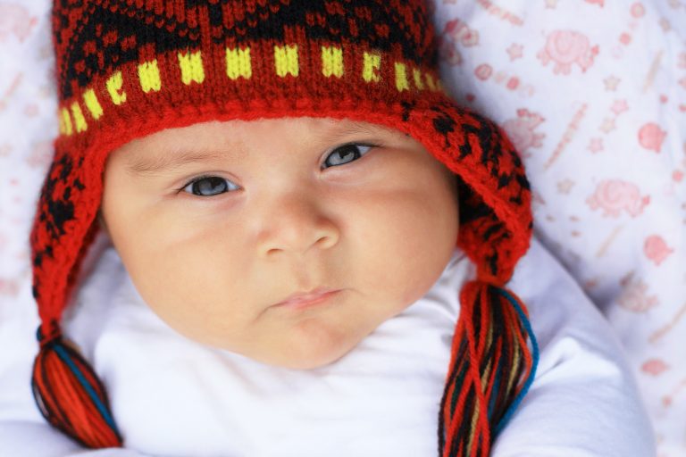 Serious latin baby boy in warm hat - peruvian credit shutterstock Serious latin baby boy in warm hat - peruvian credit shutterstock