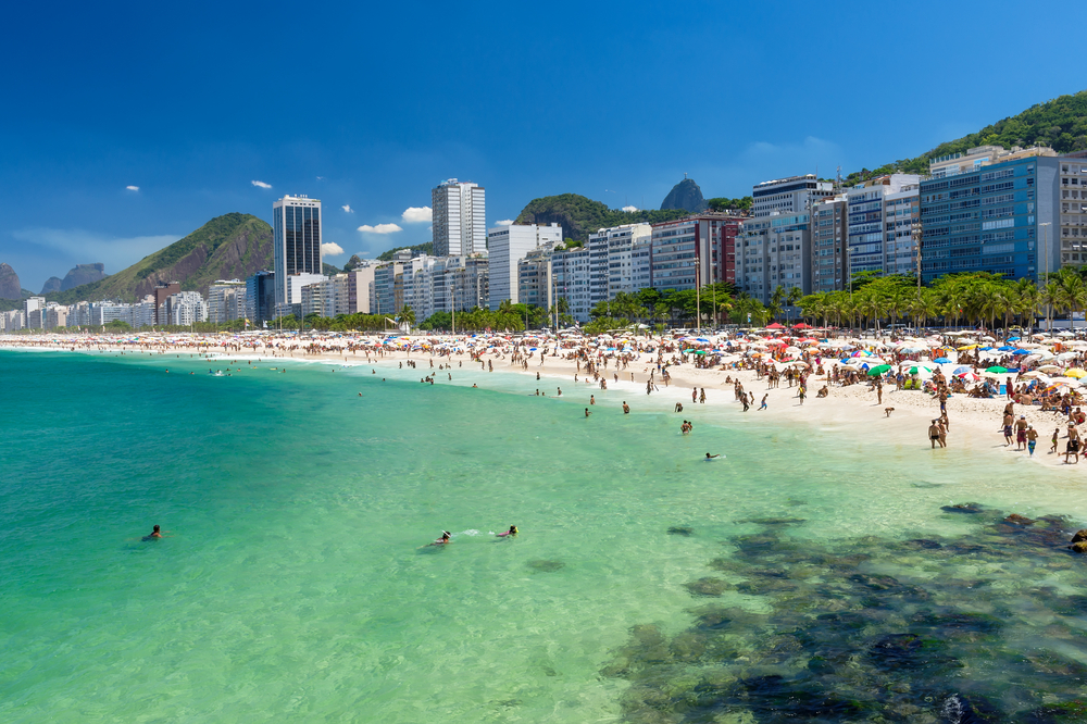 blue water and white sand beach with rio skyline blue water and white sand beach with rio skyline