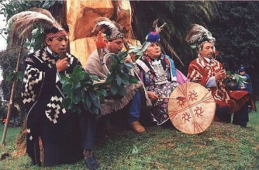 Mapuche people dressed in traditional wear and performing. Mapuche people dressed in traditional wear and performing.