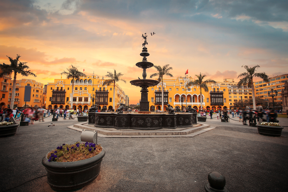 Square in lima with big fountain and surrounded by yellow houses square in lima with big fountain and surrounded by yellow houses