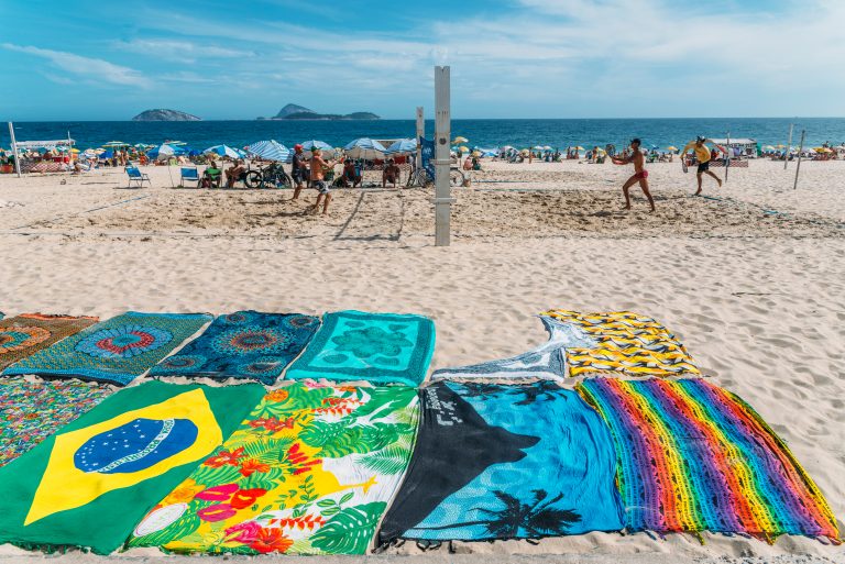 Rio de Janeiro, Brazil - January 10th, 2017: Locals, known as cariocas, play beach tennis on the beach in Ipanema, Rio de Janeiro, Brazil credit shutterstock Rio de Janeiro, Brazil - January 10th, 2017: Locals, known as cariocas, play beach tennis on the beach in Ipanema, Rio de Janeiro, Brazil credit shutterstock