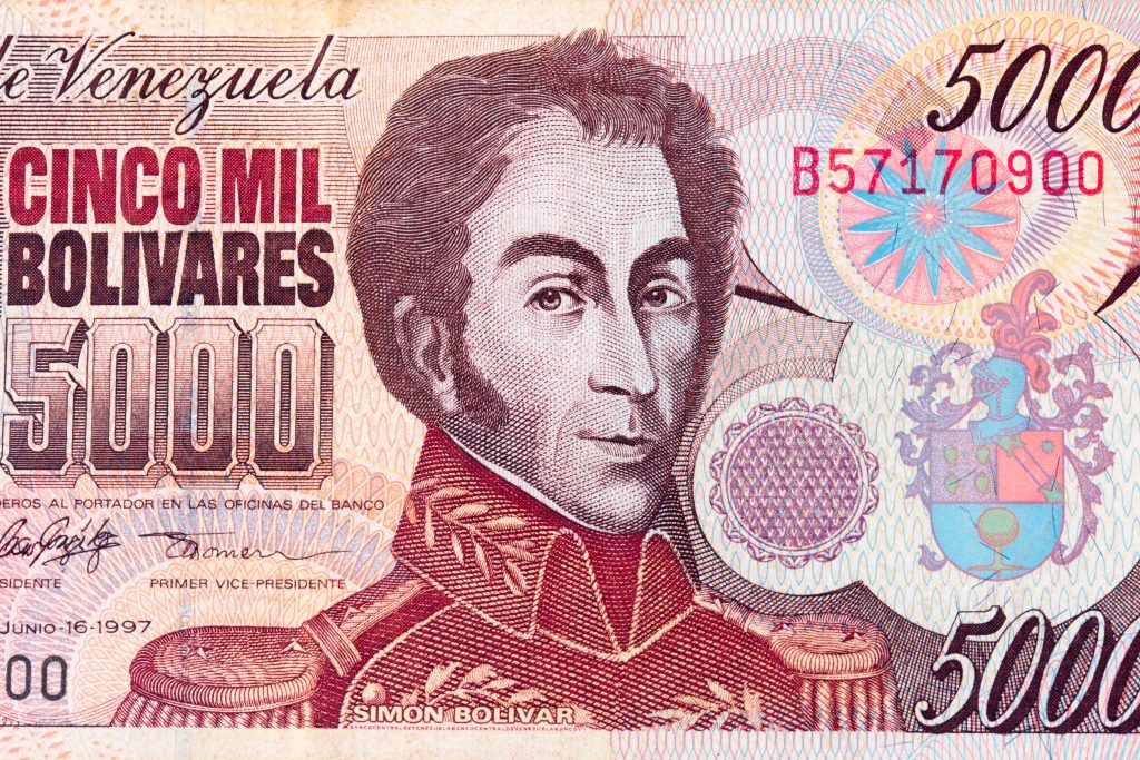 Detail of old invalid Venezuelan 5000 Bolivar banknote with the portrait of Simon Bolivar. Photo Credit: Shutterstock Detail of old invalid Venezuelan 5000 Bolivar banknote with the portrait of Simon Bolivar. Photo Credit: Shutterstock