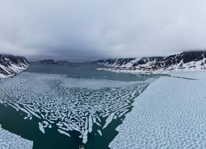 Islands in Svalbard archipelago and the frozen water of the Arctic Ocean) 
