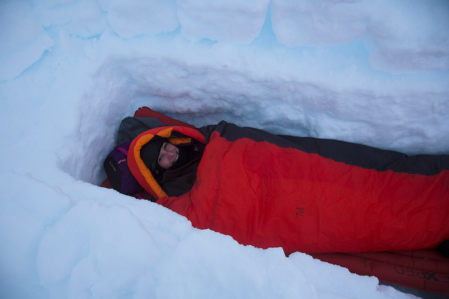 Camper in sleeping bag in Antarctica